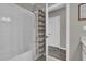 Bathroom with shower/tub combo and striped curtain at 688 Orange Belt Loop, Winter Garden, FL 34787