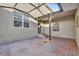 Charming courtyard with brick pavers and covered patio area at 688 Orange Belt Loop, Winter Garden, FL 34787