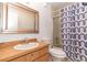 Clean bathroom with shower/tub combo and wood vanity at 4537 Ring Neck Rd # C, Orlando, FL 32808
