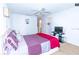 Main bedroom with a large bed and TV at 4537 Ring Neck Rd # C, Orlando, FL 32808