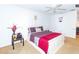 Spacious bedroom with a queen-size bed and ceiling fan at 4537 Ring Neck Rd # C, Orlando, FL 32808