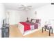 Bedroom with queen bed, sliding door, and ceiling fan at 4537 Ring Neck Rd # C, Orlando, FL 32808