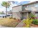 Inviting condo exterior with a well-maintained lawn and walkway at 4537 Ring Neck Rd # C, Orlando, FL 32808