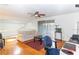 Spacious living area with hardwood floors and a cozy sitting area at 4537 Ring Neck Rd # C, Orlando, FL 32808