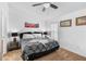King-size bed, ensuite bathroom access, and ample closet space at 1010 Clear Creek Cir, Clermont, FL 34714