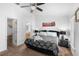 King-size bed, ensuite bathroom access, and ample closet space at 1010 Clear Creek Cir, Clermont, FL 34714