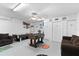 Fun game room with air hockey, foosball, and seating at 1010 Clear Creek Cir, Clermont, FL 34714