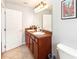 Double vanity bathroom with tile flooring and a toilet at 8007 Acadia Estates Ct, Kissimmee, FL 34747