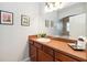 Bright bathroom boasts a sink with a view of the shower and bathtub at 8007 Acadia Estates Ct, Kissimmee, FL 34747