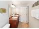 Double vanity bathroom with tile flooring and a toilet at 8007 Acadia Estates Ct, Kissimmee, FL 34747