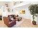 Spacious living room with high ceilings and leather furniture at 8007 Acadia Estates Ct, Kissimmee, FL 34747