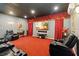 Home theater features reclining seats and a large projection screen for the ultimate movie experience at 8007 Acadia Estates Ct, Kissimmee, FL 34747