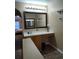 Bathroom with a vanity, mirror and wood cabinets at 15900 Sw 19Th Avenue Rd, Ocala, FL 34473