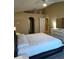 Spacious Primary bedroom with king-size bed and en-suite bathroom at 15900 Sw 19Th Avenue Rd, Ocala, FL 34473