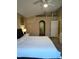 Large Primary bedroom with king-size bed and en-suite bathroom at 15900 Sw 19Th Avenue Rd, Ocala, FL 34473