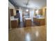 Kitchen with light wood cabinets, stainless steel appliances, and an island at 15900 Sw 19Th Avenue Rd, Ocala, FL 34473