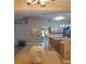Open living area with a view of the kitchen and wood floors at 15900 Sw 19Th Avenue Rd, Ocala, FL 34473