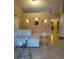 Open living room with a sectional sofa, decorative wall niches, and wood floors at 15900 Sw 19Th Avenue Rd, Ocala, FL 34473