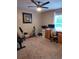 Home office with a desk, chair, and exercise equipment at 15900 Sw 19Th Avenue Rd, Ocala, FL 34473