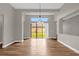 Open dining area with view to backyard and sliding doors at 4014 Sunburst View Cir, Kissimmee, FL 34746