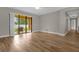 Bright living room with sliding glass doors leading to patio at 4014 Sunburst View Cir, Kissimmee, FL 34746