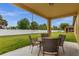 Patio with seating area and backyard view at 4014 Sunburst View Cir, Kissimmee, FL 34746