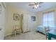 Bedroom featuring neutral walls, a ceiling fan, large wardrobe, and natural light at 12854 Sw 77Th Cir, Ocala, FL 34473