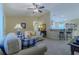 Spacious living room with bar seating, perfect for entertaining, and comfortable couches at 12854 Sw 77Th Cir, Ocala, FL 34473