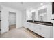 Bathroom boasts a double vanity with granite countertop at 1856 Red Loop, Lakeland, FL 33801