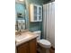 Clean bathroom with vanity, toilet and shower at 457 Enright Pl, The Villages, FL 32162