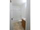 Clean bathroom with a shower/tub combo and wood vanity at 4852 Magnolia Preserve Dr, Winter Haven, FL 33880