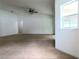 Bright living room featuring neutral walls and carpeted floor at 4852 Magnolia Preserve Dr, Winter Haven, FL 33880