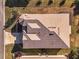 Top-down view of the house, showcasing the roofline and landscaping at 11276 Se 170Th Pl, Summerfield, FL 34491