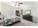 Bright bedroom with a comfy bed and plenty of closet space at 11276 Se 170Th Pl, Summerfield, FL 34491