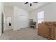 Bedroom with closet and view into another room at 11276 Se 170Th Pl, Summerfield, FL 34491