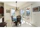 Casual breakfast nook with table and chairs near sliding doors at 11276 Se 170Th Pl, Summerfield, FL 34491