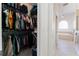 Walk-in closet with ample shelving and hanging space at 11276 Se 170Th Pl, Summerfield, FL 34491