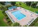 Relaxing community pool with ample deck space and seating at 11276 Se 170Th Pl, Summerfield, FL 34491