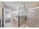 Bathroom features a shower, tub, and access to bedroom at 2016 Sanderlin Point Loop, Apopka, FL 32703