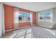 Bright dining area with large windows and patterned rug at 2016 Sanderlin Point Loop, Apopka, FL 32703