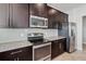 Kitchen with stainless steel appliances and granite countertops at 2016 Sanderlin Point Loop, Apopka, FL 32703