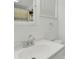 Clean bathroom with white vanity, sink, and toilet at 270 N 1St St, Lake Mary, FL 32746