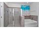 Bathroom with shower and separate tub at 1320 Se 63Rd Court Rd, Ocala, FL 34472