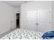 Bedroom with double doors leading to another room at 1320 Se 63Rd Court Rd, Ocala, FL 34472