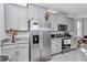 Modern kitchen with gray cabinets and granite countertops at 1320 Se 63Rd Court Rd, Ocala, FL 34472