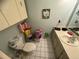 Bathroom with double vanity and a toilet at 1880 N Crystal Lake Dr # 57, Lakeland, FL 33801