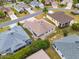 House and surrounding homes from above at 461 Troy Loop, The Villages, FL 32162