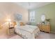 Charming bedroom with a double bed and plenty of light at 461 Troy Loop, The Villages, FL 32162