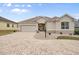 One-story house with a paver driveway at 461 Troy Loop, The Villages, FL 32162