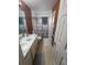 Bathroom with shower/tub combo and updated vanity at 4635 Deer Run Rd, St Cloud, FL 34772